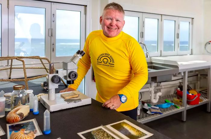 Eric Fisher serves as the biology manager aboard the Reef Magic pontoon.