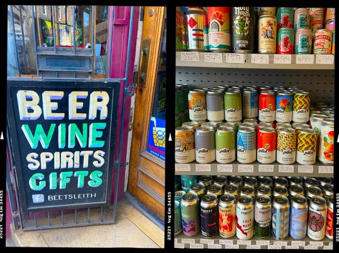 Craft beer cans displayed in a bottle shop