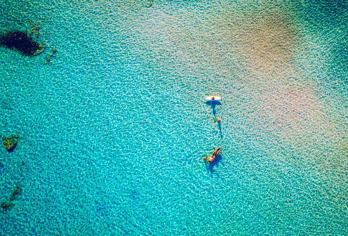 DEST_GREECE_CRETE_ELAFONISSI_THEME_AERIAL_BEACH_OCEAN_PEOPLE-shutterstock-portfolio_1607620696.jpg