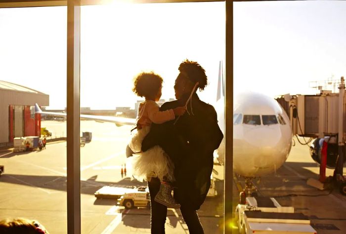 people_mother_daughter_flight_airport