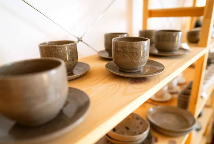 A display of ceramics in a pottery workshop.