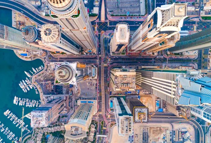 A breathtaking aerial view of Dubai showcasing its towering skyscrapers and marina.