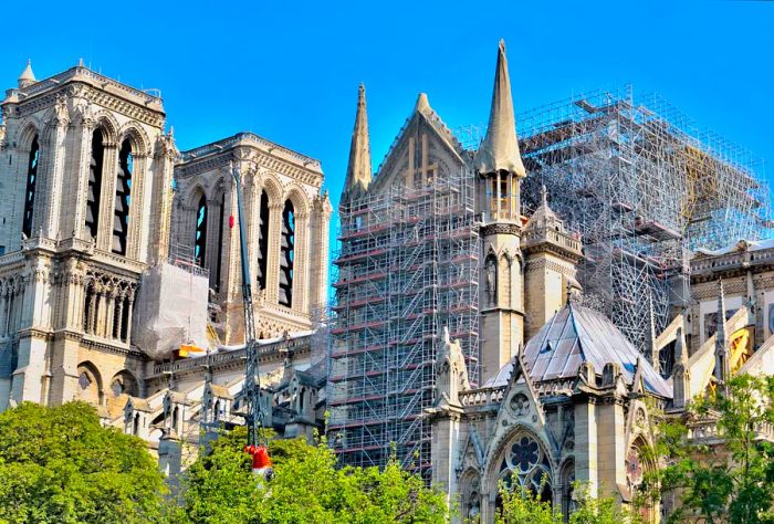 Scaffolding surrounds the facade of the Notre Dame Cathedral following the fire.