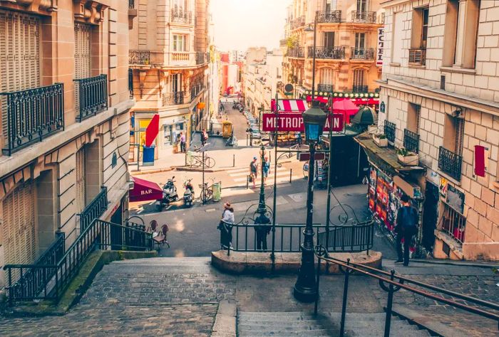 Stairs leading to Montmartre and the entrance to the Paris Metro in France