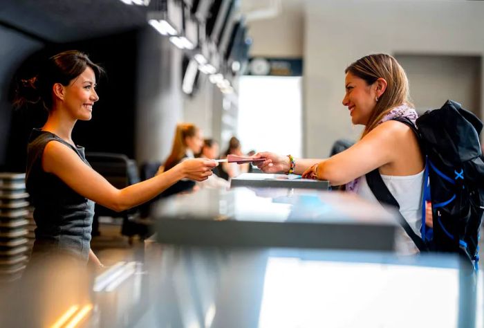 A woman checking in at the airport.