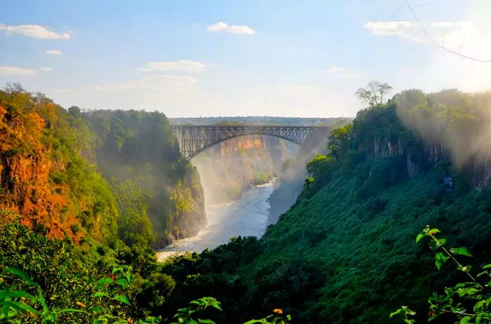 Victoria Falls, straddling the Zambezi River on the border of Zambia and Zimbabwe.