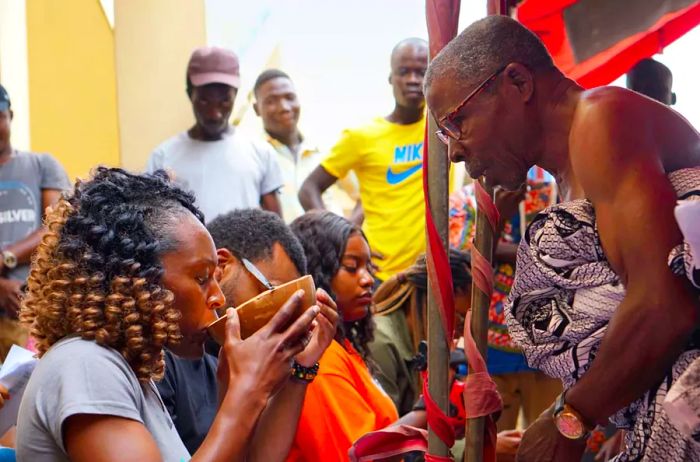 Participants engage in a naming ceremony in Ghana