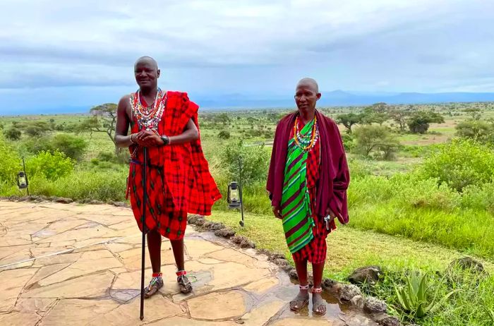 Meoli, the son of the Maasai Chief, alongside Maasai elder Phillip at the Elewana Tortilis Camp.