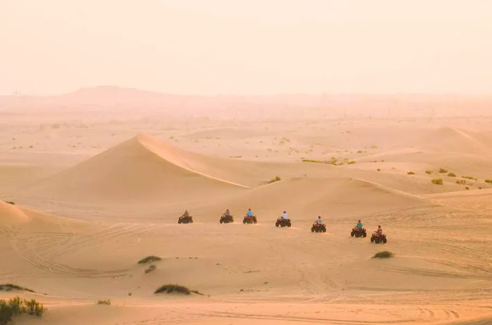 Dune buggy tour traversing the desert in Dubai