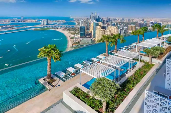 An aerial shot captures the infinity pool situated on the 77th floor of Address Beach Resort Dubai.