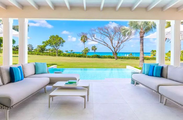 View of the beach and plunge pool from a private guest room