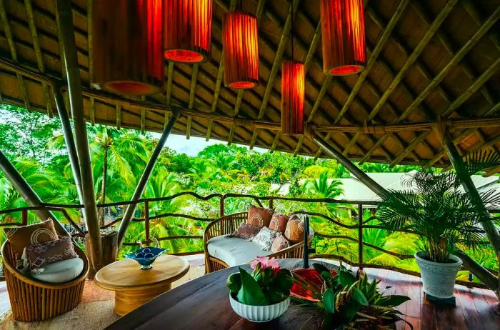 The open-air upper deck lounge area at Nayara Bocas del Toro Treehouses in Panama