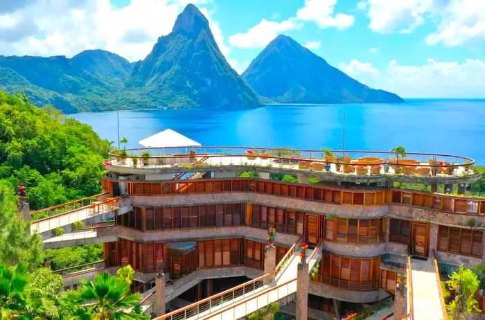 A view showcasing the rooftop lounge and walkways with stunning mountain vistas at Jade Mountain