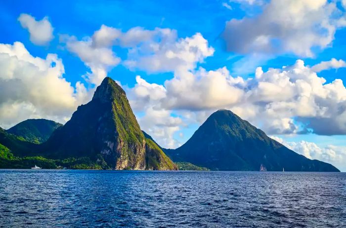 A breathtaking view of the mountains from Petit Piton in St. Lucia under clear blue skies