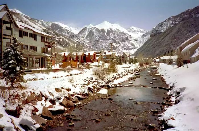 Image showcasing the town of Telluride, Colorado, with the stunning San Juan Mountains in the backdrop.