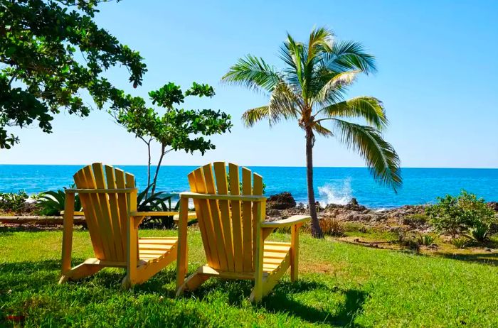 Lounge chairs oriented toward the sea at Jakes resort in Jamaica