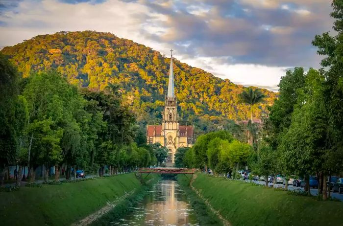 Petropolis Cathedral of Saint Peter of Alcantara alongside the Koeller Avenue Canal in Petropolis, Rio de Janeiro, Brazil.