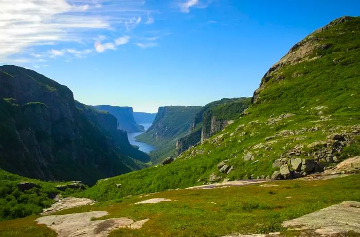 A picturesque view of the cliffs surrounding Western Brook Pond from the Long Range Traverse hiking trail in Gros Morne National Park, Newfoundland & Labrador, Canada