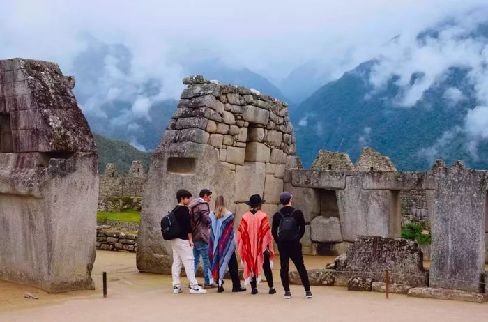 A gathering of individuals at Machu Picchu