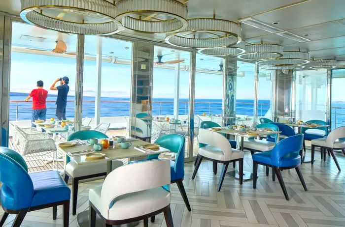 Dining room offering ocean views on the National Geographic Islander II