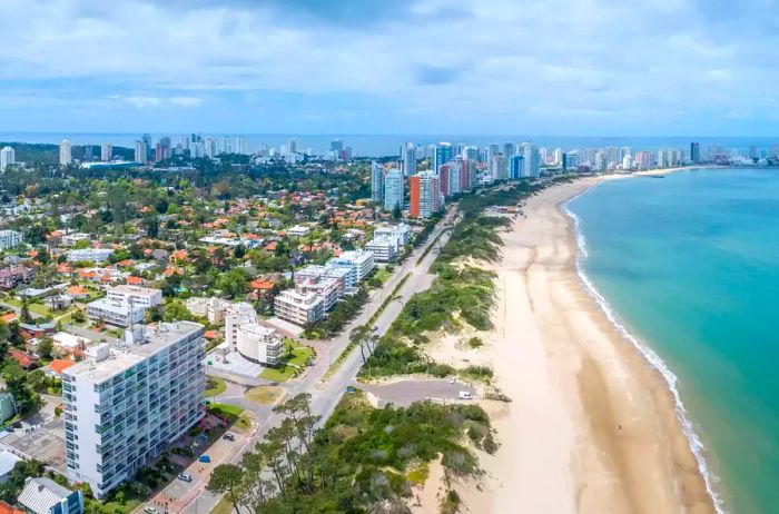 Aerial view of the beautiful coastline and beaches of Punta del Este captured during the day.