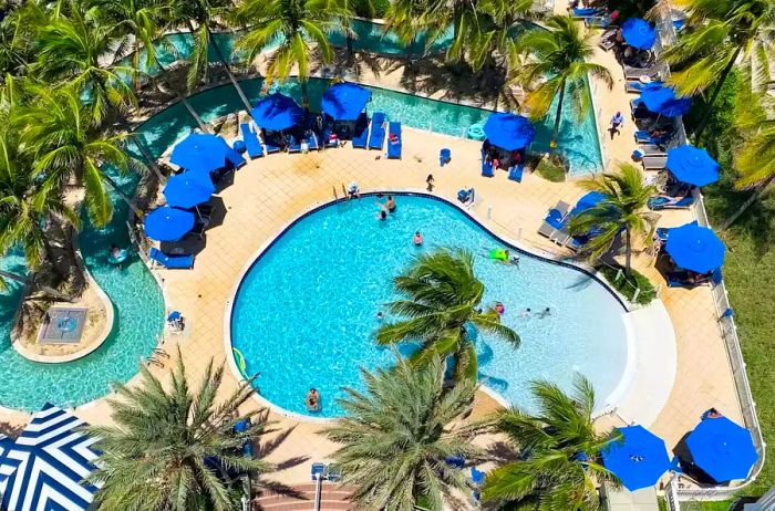 Aerial view of the pool at Pelican Grand Beach Resort