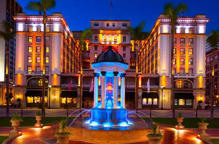 Nighttime view of the exterior of The US Grant hotel