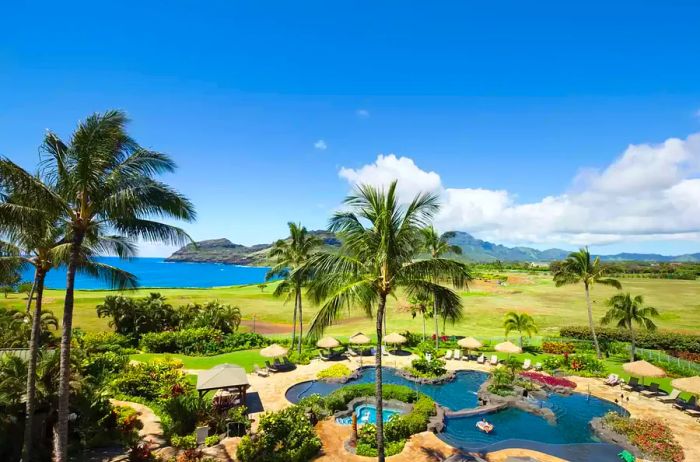 A view showcasing the pool area and landscaping at Marriott's Kauai Lagoons