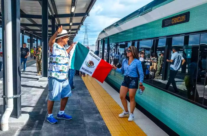 Travelers at the Merida-Teya station ready to board the Maya Train in Teya