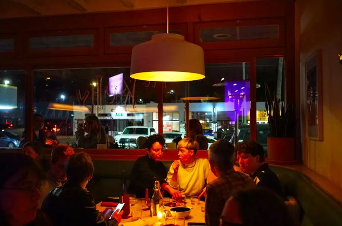 A vibrant bar atmosphere after dark.