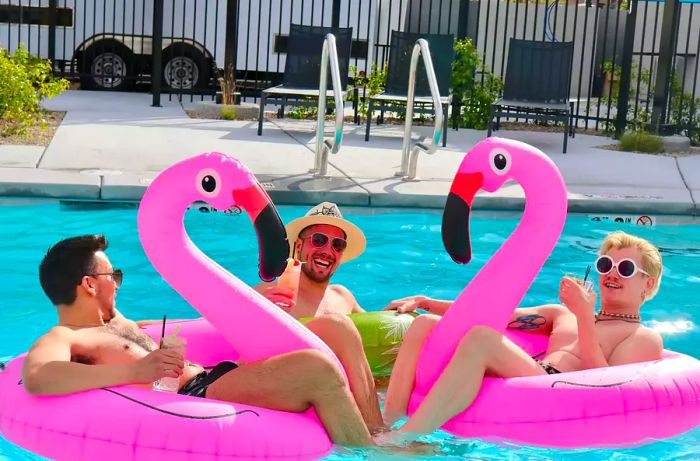 Guests enjoying the pool at the Bent Inn in Vegas