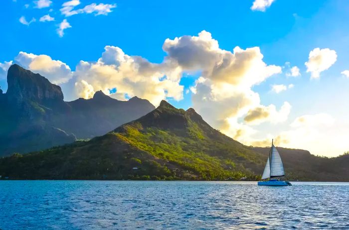 Sailboat with the verdant backdrop of Bora Bora