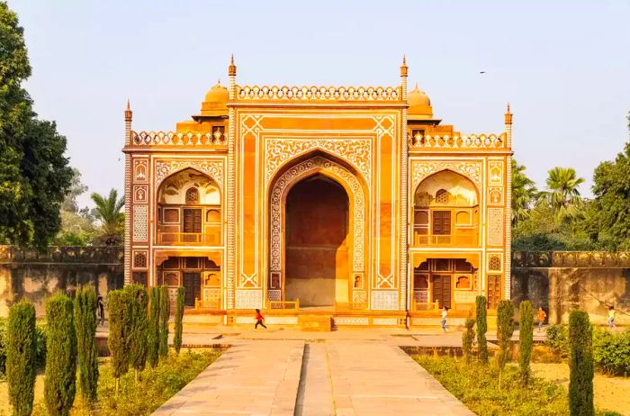 A child dashes past a building in Agra