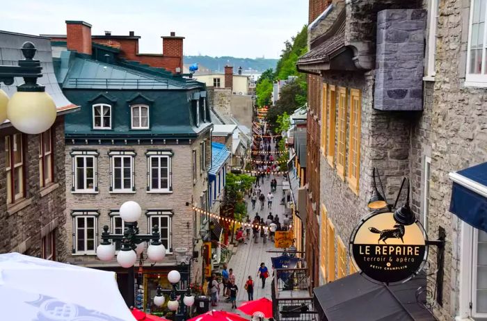 A view of people strolling through Old Quebec on a sunny day