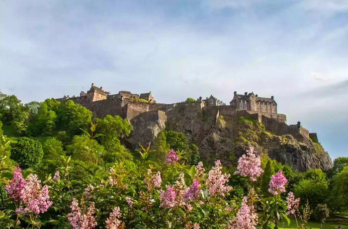 Edinburgh Castle surrounded by blooming flowers