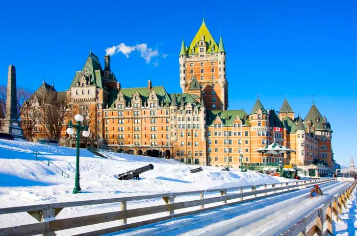 Chateau Frontenac in winter, with a slide path in Quebec City