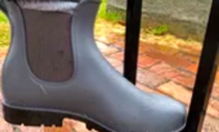 The Asgard Chelsea Ankle Waterproof Rain Boots during a downpour