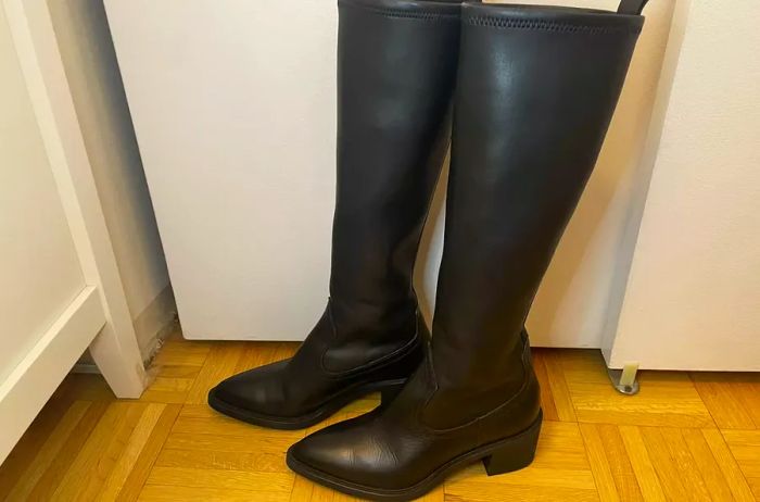 A pair of La Canadienne Paton Leather Boots displayed