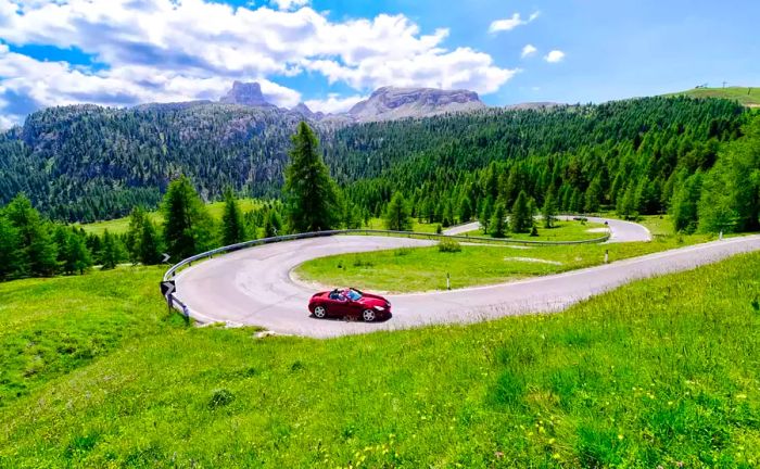 Vehicle navigating a winding road