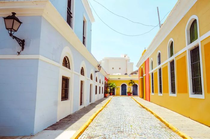 Vibrant buildings and a cobblestone street in San Juan, Puerto Rico