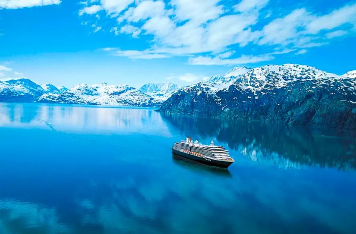 Westerdam navigating through snowy mountains