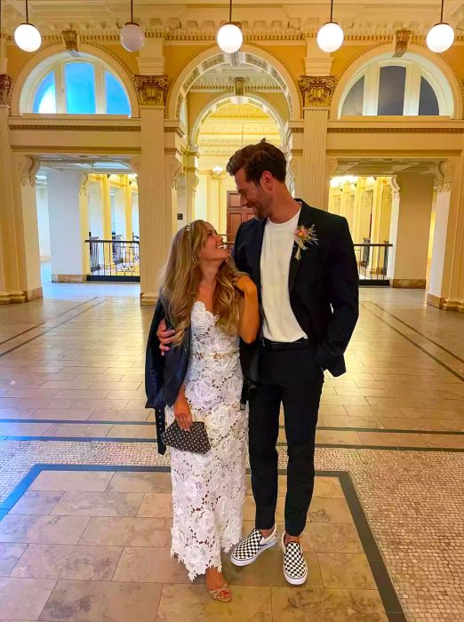 A bride and groom inside the Providence Public Library