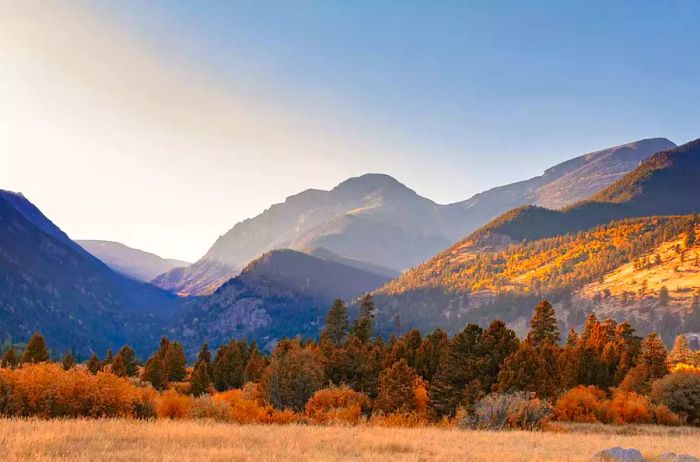 Breathtaking view of the Rocky Mountains in Colorado bathed in warm light