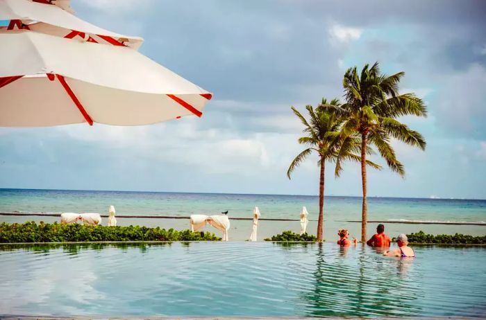 People enjoying a pool in Mexico