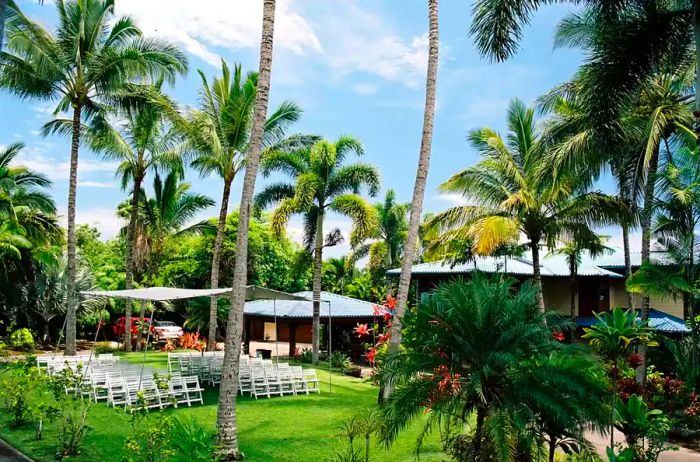 A wedding setup in front of a mansion in Hawaii