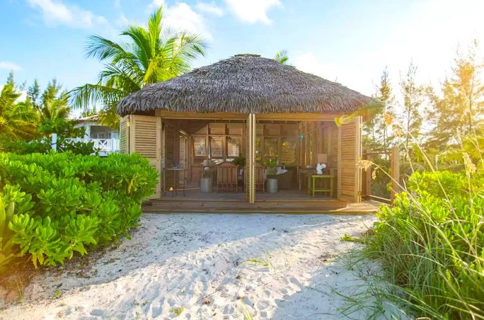 A beach bungalow at Kamalame Cay