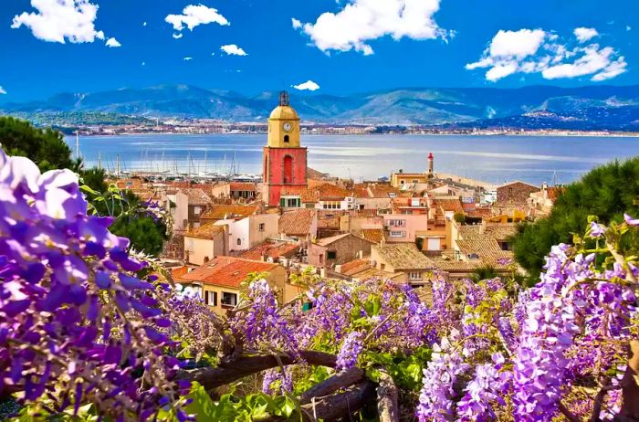 View of the village church tower and old rooftops in Saint Tropez