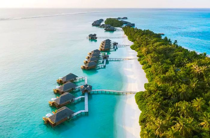 Aerial view of over water bungalows at Conrad Maldives Rangali Island