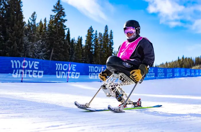 A paraplegic skiing down a slope