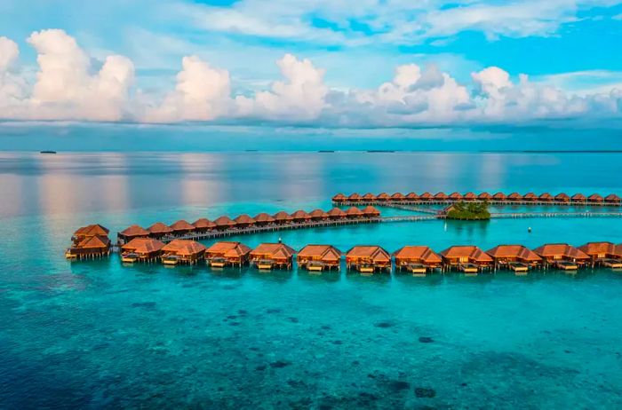 Aerial drone view showcasing a luxurious resort in the Maldives